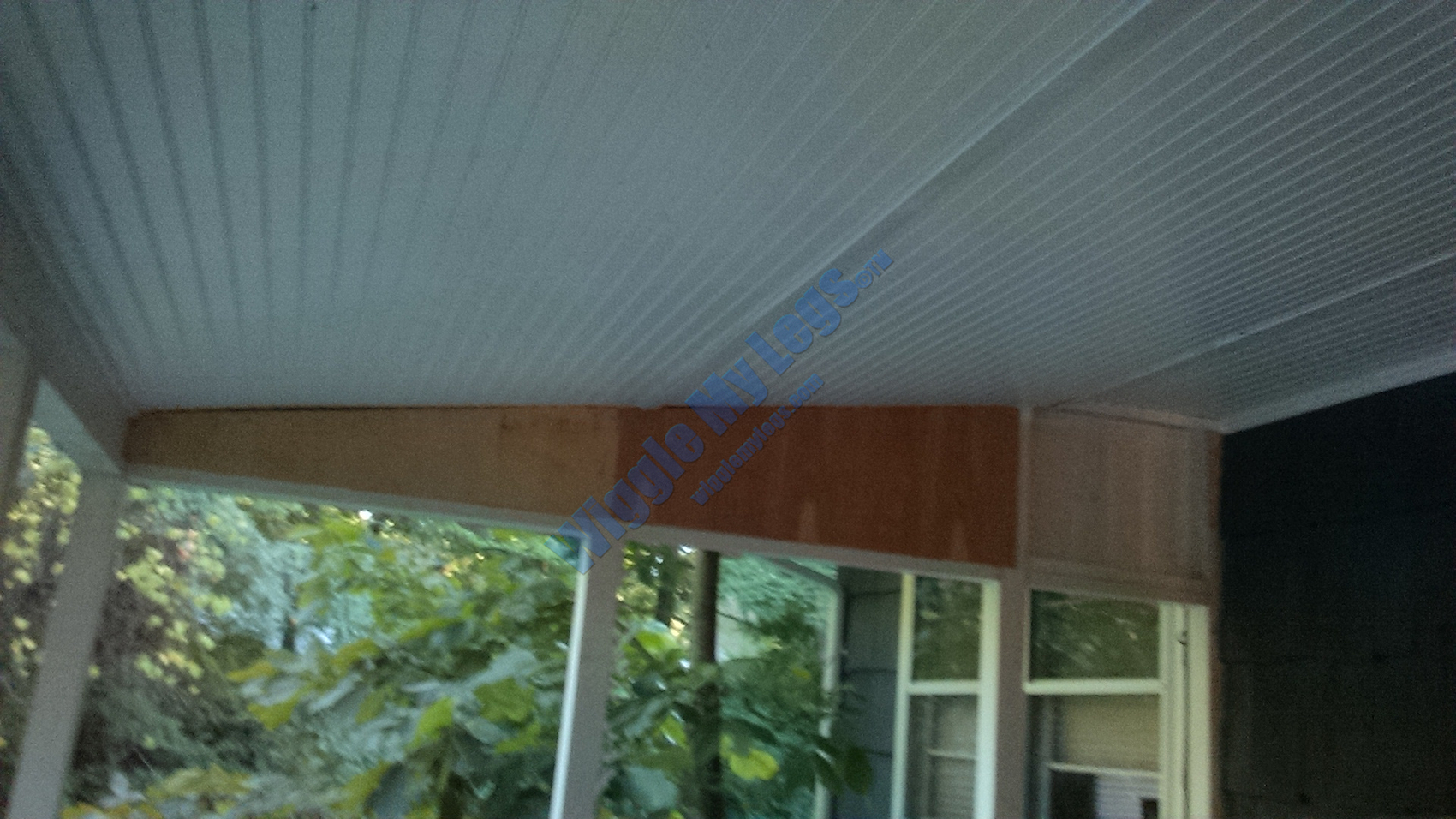 Showing two of three plywood panels installed on one end of deck interior.