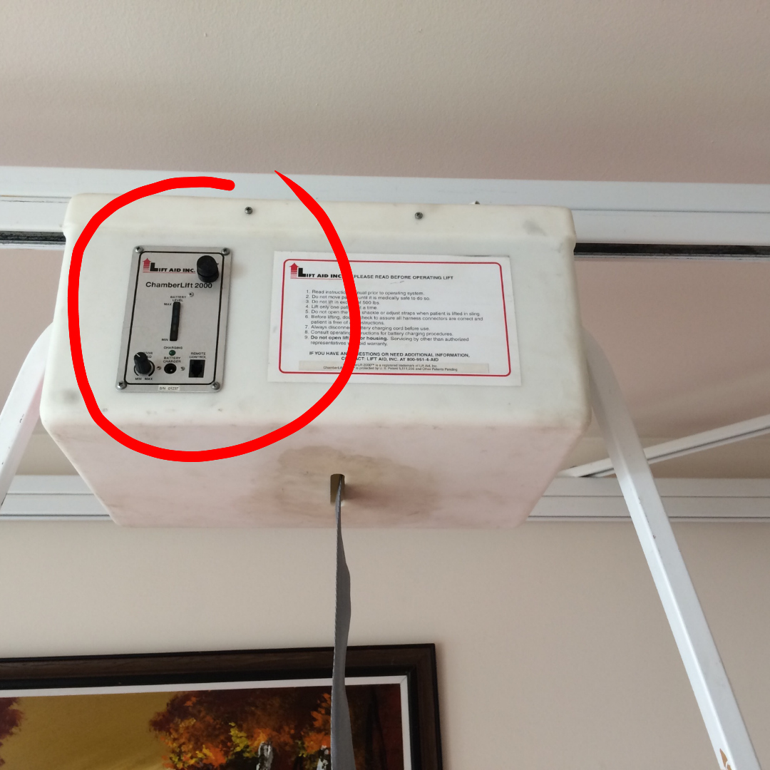 Photo of hoist assembly highlighting location of PCB control panel installed.