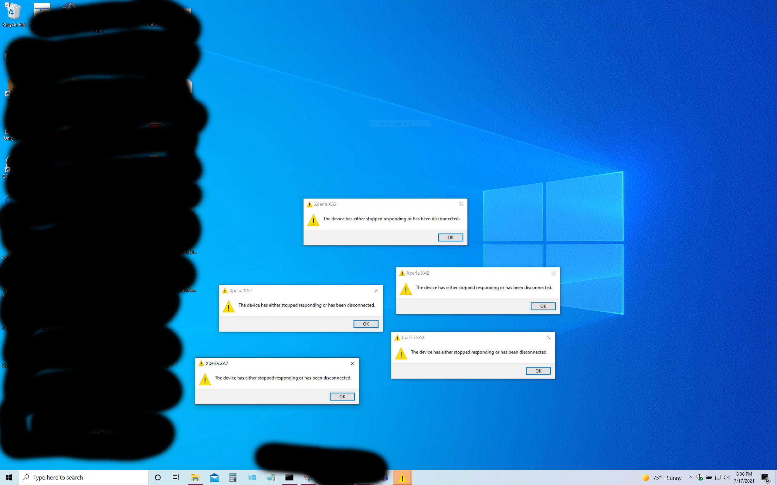 Picture of 5 disconnection dialgue boxes spread out on desktop after removing USB cable from XA2
